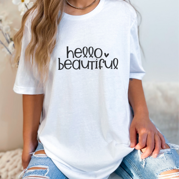 Hello Beautiful T-shirt  Tell someone you think they are beautiful. A great gift for your girlfriend, best friend, mum or yourself!   Our Tees are soft & Comfortable to help you feel cozy and relaxed. They come in several colours and true to fit sizes. (Go up a size for a more oversized, relaxed fit)  Unisex T-shirts - suitable for men and women.