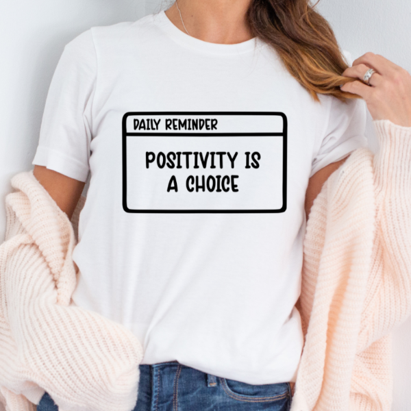 Daily reminder - Positivity is a choice  An affirmation reminder to promote strength and positivity.  Our Tees are soft & Comfortable to help you feel cozy and relaxed. They come in several colours and true to fit sizes. (Go up a size for a more oversized, relaxed fit)  Unisex T-shirts - suitable for men and women.  Colours available - White, Black, Indigo Blue, Military Green, Sand, Natural, Navy, Red, or Grey Tee