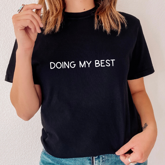Doing my best  Our Tees are soft & Comfortable to help you feel cozy and relaxed. They come in several colours and true to fit sizes. (Go up a size for a more oversized, relaxed fit)  Unisex T-shirts - suitable for men and women.  Colours available - White, Black, Indigo Blue, Military Green, Sand, Natural, Navy, Red, or Grey Tee