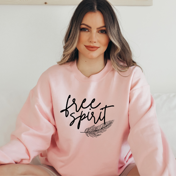 Free Spirit sweatshirts (Feather)  Design also available in T-shirts and Hoodies. Unisex sizing for relaxed fit.  6 colours - Sand, White, Black, Grey, Pink or Navy Crew neck sweatshirt  Details • Classic Unisex fit • Sizes S - XL • 50% Cotton / 50% Polyester preshrunk fleece knit • 6 colours - Sand, White, Black, Grey, Pink, Navy