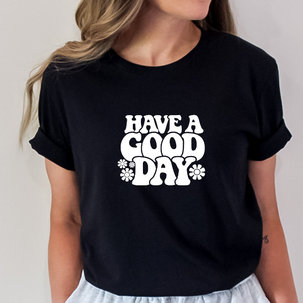 Have a good day  We have the perfect Good Vibes t-shirt for you! Our "Have a good day" shirt is the perfect way to spread happiness. This tee features a bright and uplifting message that will bring a smile to everyone who sees it.  Our Tees are soft & Comfortable to help you feel cozy and relaxed. They come in several colours and true to fit sizes. (Go up a size for a more oversized, relaxed fit)  Unisex T-shirts - suitable for men and women.