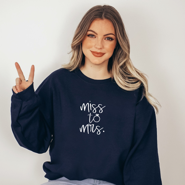 Miss to Mrs sweatshirts  These beautiful Miss to Mrs sweatshirts make lovely Engagement gifts, wedding announcements or bridal gifts. Also a favourite hens party gift or honeymoon purchase for the new bride.   Warm and cozy sweatshirts. True to fit sizing. (Size up for the oversized look). Unisex  sizing so suitable for men and women.