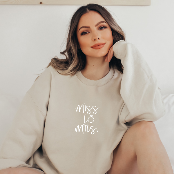 Miss to Mrs sweatshirts  These beautiful Miss to Mrs sweatshirts make lovely Engagement gifts, wedding announcements or bridal gifts. Also a favourite hens party gift or honeymoon purchase for the new bride.   Warm and cozy sweatshirts. True to fit sizing. (Size up for the oversized look). Unisex  sizing so suitable for men and women.