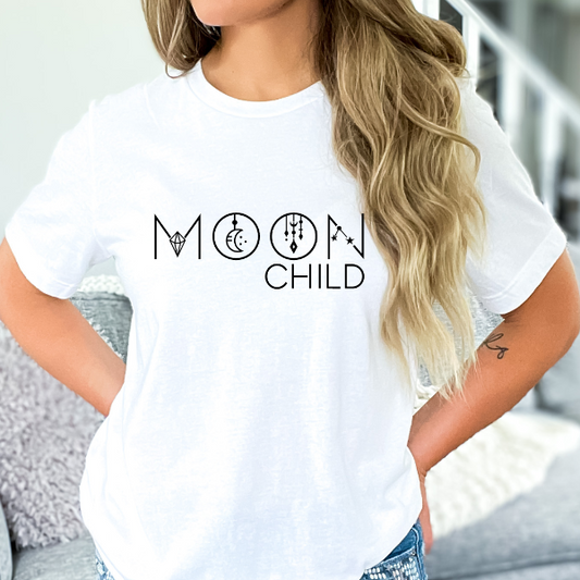 Moon Child  A great good vibes t-shirts with the phrase "Moon Child" on it.  Our Tees are soft & Comfortable to help you feel cozy and relaxed. They come in several colours and true to fit sizes. (Go up a size for a more oversized, relaxed fit)  Unisex T-shirts - suitable for men and women.  Colours available - White, Black, Indigo Blue, Military Green, Sand, Natural, Navy, Red, or Grey Tee