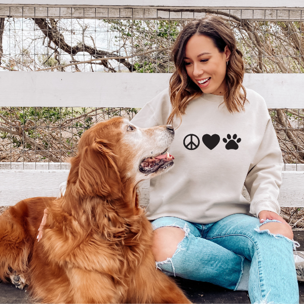 Peace Love Paw sweatshirts  We have a great selection of dog lover t-shirts available to show your support for mans best friend! Our clothing features a variety of designs, colors, and sizes to choose from here at Marley and Max Collective. Our apparel is unisex so suitable for men and women. Design is available on T-shirt, sweatshirt and Hoodie