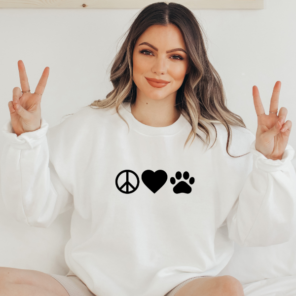 Peace Love Paw sweatshirts  We have a great selection of dog lover t-shirts available to show your support for mans best friend! Our clothing features a variety of designs, colors, and sizes to choose from here at Marley and Max Collective. Our apparel is unisex so suitable for men and women. Design is available on T-shirt, sweatshirt and Hoodie