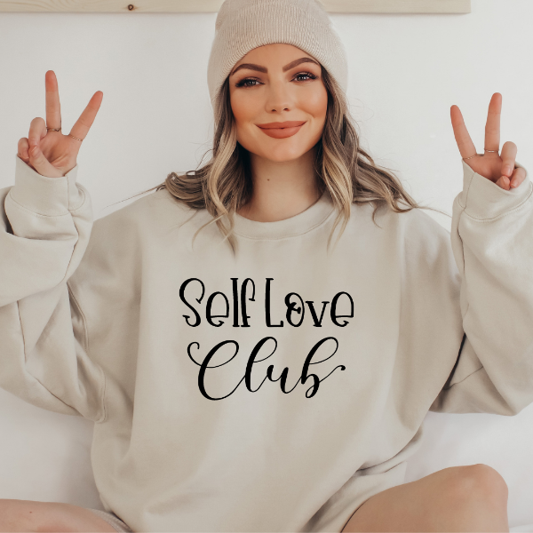 Self Love Club sweatshirts  Design also available in T-shirts and Hoodies. Unisex sizing for relaxed fit.  6 colours - Sand, White, Black, Grey, Pink or Navy Crew neck sweatshirt