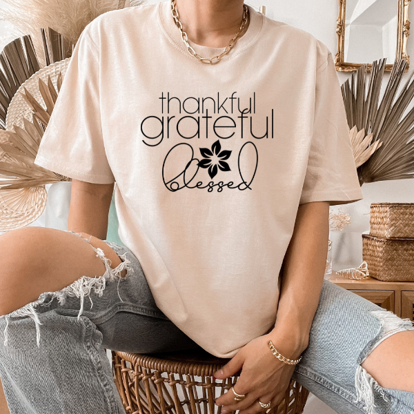 Thankful Grateful Blessed  We have a great selection of t-shirts with Christian phrases and other Faith inspired messages.  Our Tees are soft & Comfortable to help you feel cozy and relaxed. They come in several colours and true to fit sizes. (Go up a size for a more oversized, relaxed fit)  Unisex T-shirts - suitable for men and women.  Colours available - White, Black, Indigo Blue, Military Green, Sand, Natural, Navy, Red, or Grey Tee