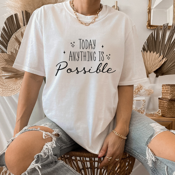 Today anything is possible  A great t-shirts with the phrase "Today anything is possible" on it.  Our Tees are soft & Comfortable to help you feel cozy and relaxed. They come in several colours and true to fit sizes. (Go up a size for a more oversized, relaxed fit)  Unisex T-shirts - suitable for men and women.