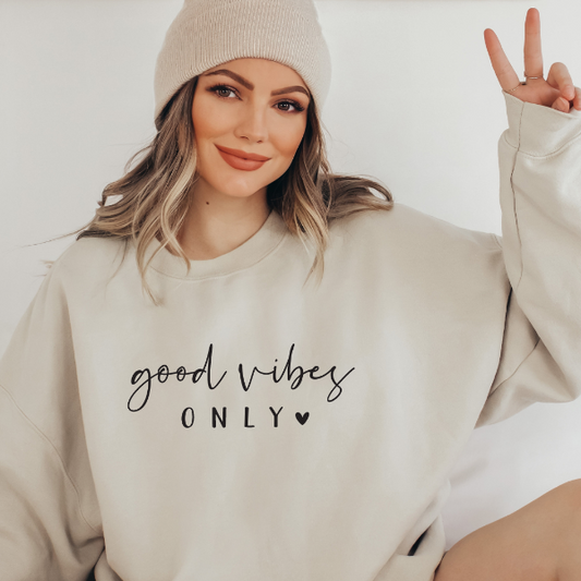 Good Vibes only  Design also available in T-shirts and Hoodies. Unisex sizing for relaxed fit.  6 colours - Sand, White, Black, Grey, Pink or Navy Crew neck sweatshirt  Details • Classic Unisex fit • Sizes S - XL • Cotton / Polyester blend - soft and comfy • 6 colours - Sand, White, Black, Grey, Pink, Navy