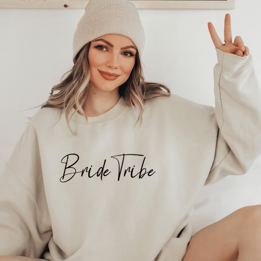 Bride tribe sweatshirts  Looking for a Bridesmaid gift? How about a quality, cozy sweatshirt, for your bridesmaid proposal printed with a special message saying "Bride Tribe?" This fantastic gift will be a special keepsake that your bridesmaid can cherish for many years to come.  Design also available in T-shirts and Hoodies  Warm and cozy sweatshirts. True to fit sizing. (Size up for the oversized look). Unisex  sizing so suitable for men and women.  6 colours - Sand, White, Black, Grey, Pink or Navy 