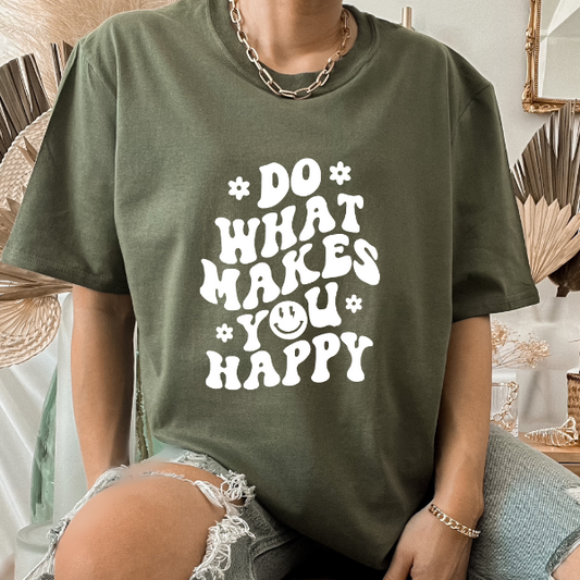 Do what makes you happy T-shirt  A great good vibes t-shirts with the phrase "Do what makes you happy" on it.  Our Tees are soft & Comfortable to help you feel cozy and relaxed. They come in several colours and true to fit sizes. (Go up a size for a more oversized, relaxed fit)  Unisex T-shirts - suitable for men and women.  Colours available - White, Black, Indigo Blue, Military Green, Sand, Natural, Navy, Red, or Grey Tee