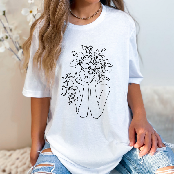 Floral Lady T-shirt  A great t-shirts with the design "Floral Lady" on it. Simple and elegant - a nice tee to wear casually at home or going out!  Our Tees are soft & Comfortable to help you feel cozy and relaxed. They come in several colours and true to fit sizes. (Go up a size for a more oversized, relaxed fit)  Unisex T-shirts - suitable for men and women.  Colours available - White, Black, Indigo Blue, Military Green, Sand, Natural, Navy, Red, or Grey Tee