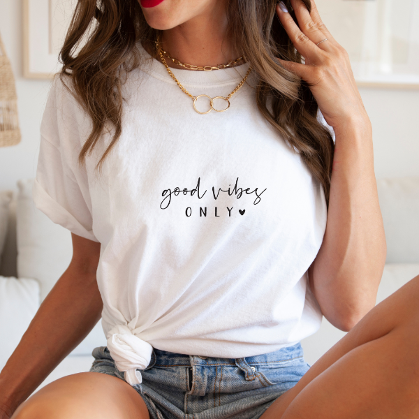 Good Vibes Only  A great t-shirts with the phrase "Good Vibes only" on it.  Our Tees are soft & Comfortable to help you feel cozy and relaxed. They come in several colours and true to fit sizes. (Go up a size for a more oversized, relaxed fit)  Unisex T-shirts - suitable for men and women.  Colours available - White, Black, Indigo Blue, Military Green, Sand, Natural, Navy, Red, or Grey Tee