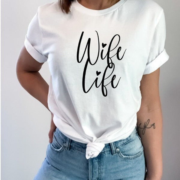 Wife Life T-shirt  Great for the new bride, engagement party or Hens Party!  Our Tees are soft & Comfortable to help you feel cozy and relaxed. They come in several colours and true to fit sizes. (Go up a size for a more oversized, relaxed fit)  Unisex T-shirts - suitable for men and women.  Colours available - White, Black, Indigo Blue, Military Green, Sand, Natural, Navy, Red, or Grey Tee