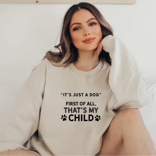 Its just a dog - First of all thats my child sweatshirts A cute sweatshirt for the dog lover! Unisex sweatshirt in 6 colours - Sand, White, Black, Grey, Pink or Navy Details • Classic Unisex fit • Sizes S - XL • 50% Cotton / 50% Polyester preshrunk fleece knit • 6 colours - Sand, White, Black, Grey, Pink, Navy