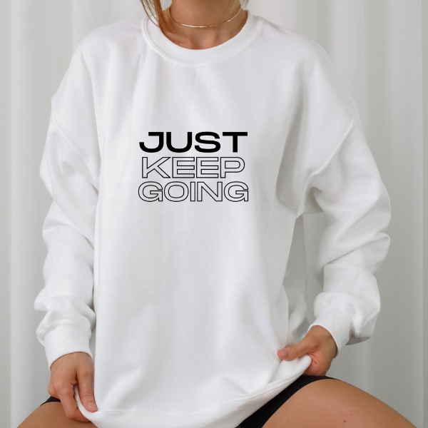 Just keep going sweatshirts  This 'Just keep going' Sweatshirt is a great reminder to push through in life!  Warm and cozy sweatshirts. True to fit sizing. (Size up for the oversized look). Unisex  sizing so suitable for men and women.  6 colours - Sand, White, Black, Grey, Pink or Navy 