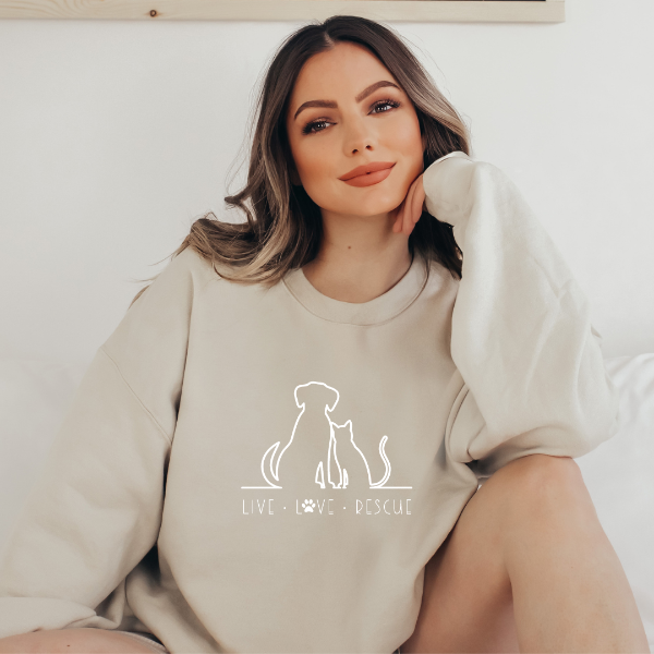 Live Love rescue sweatshirts  Our Rescue Dogs design is "Live love Rescue" printed across the chest. A great gift for any pet lover and can help spread awareness of the importance of rescuing animals.   Unisex sweatshirt in 6 colours - Sand, White, Black, Grey, Pink or Navy