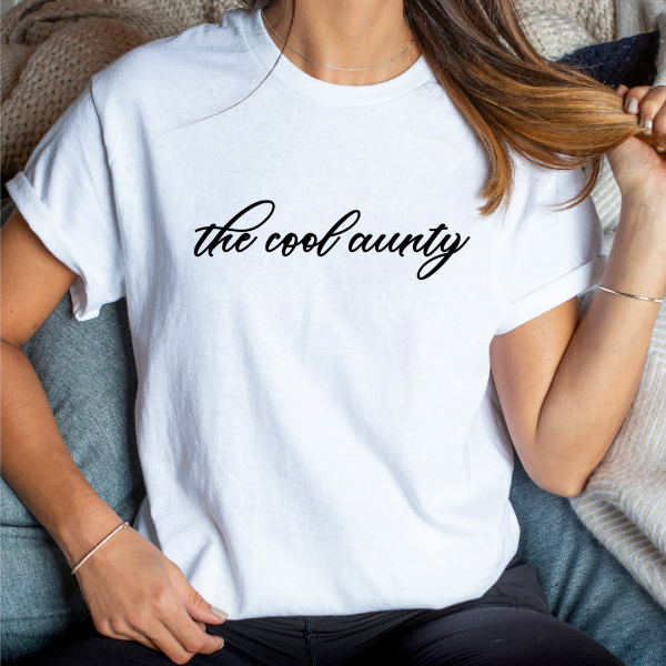Cool aunty club  A great t-shirts with the phrase "The cool aunty" on it.   Our Tees are soft & Comfortable to help you feel cozy and relaxed. They come in several colours and true to fit sizes. (Go up a size for a more oversized, relaxed fit)  Unisex T-shirts - suitable for men and women.  Colours available 